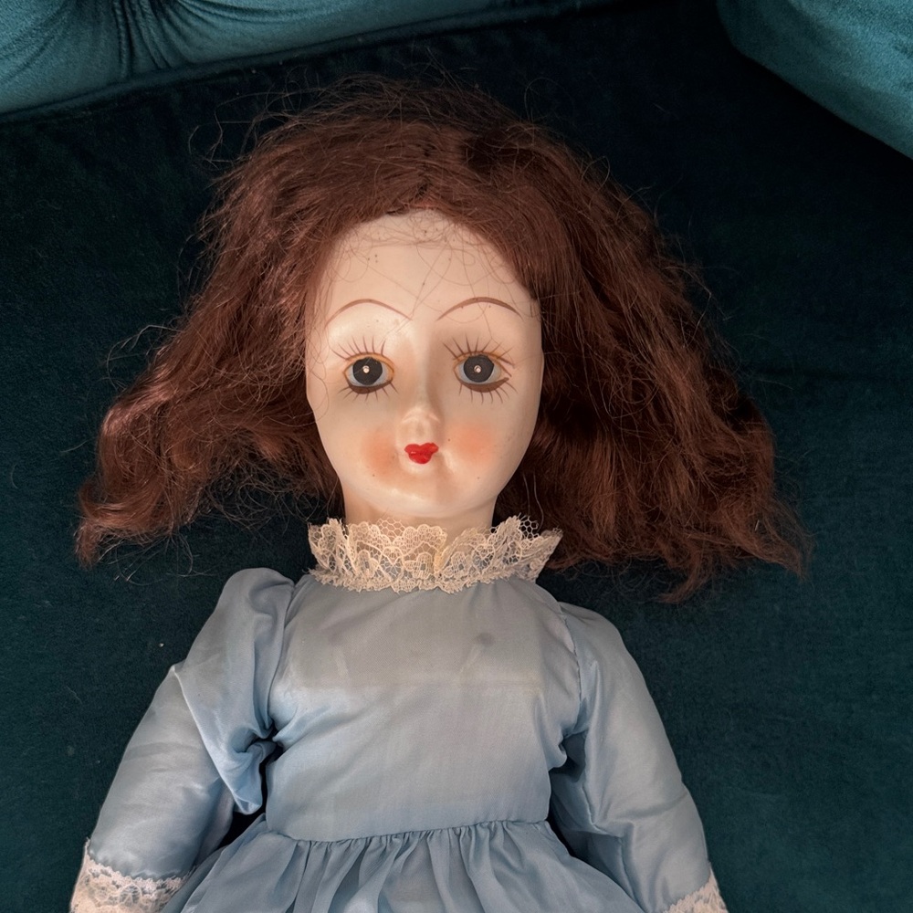 Vintage porceline Doll with Blue Dress and Brown red Hair